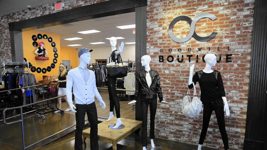 The O.C. Goodwill Boutique in Huntington Beach features wooden floors and artfully arranged clothing displays. (Allen J. Schaben / Los Angeles Times)